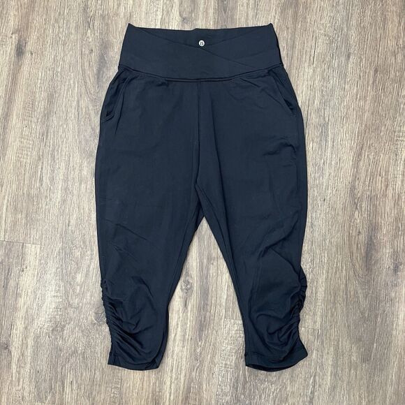 Lululemon Size 10 Pants Sun Salutation Crop Black Fold Over Waist Ruched Loose - Picture 4 of 14